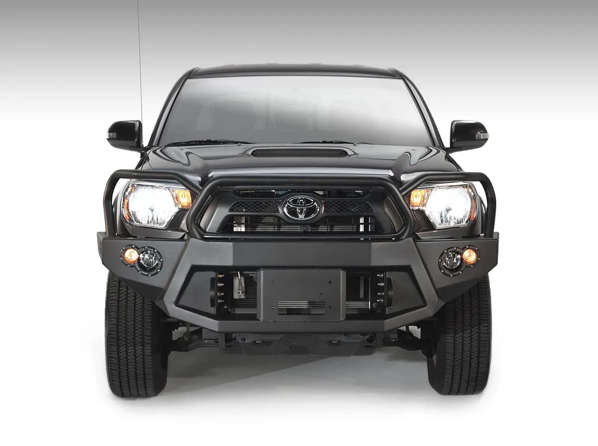 Premium Heavy Duty Winch Front Bumper; 2 Stage Black Powder Coated; w/Full Grill Guard; Incl. 1in. D-Ring Mounts/Light Cut-Outs w/Fab Fours 90mm Fog Lamps/60mm Turn Signals;