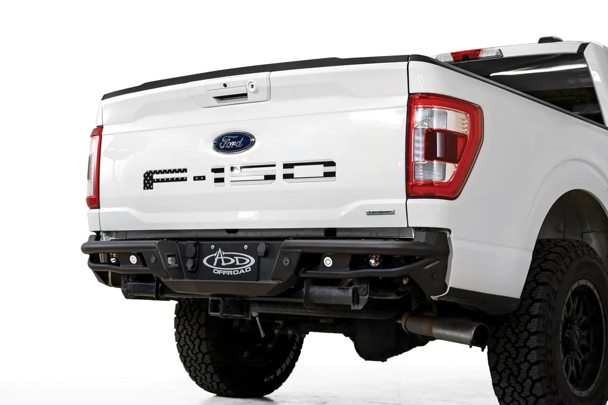 The ADD Pro Bolt-On Rear Bumper for the 2021 Ford F-150 was designed to match the same slim prerunner style of the front Pro Bolt-On Bumper. Constructed from .120-inch wall steel tubing it provides durable protection to the rear of your truck. The top p