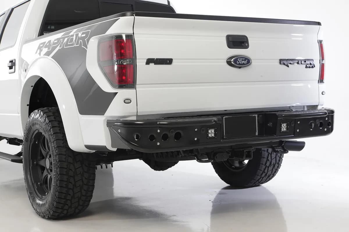 2010 - 2014 Ford Raptor 2009 - 2014 Ford F-150 2011 - 2014 Ford Ecoboost F-150 Venom Rear Bumper with Dually light mounts with back up sensor cut outs in Hammer Black with Satin Black panels