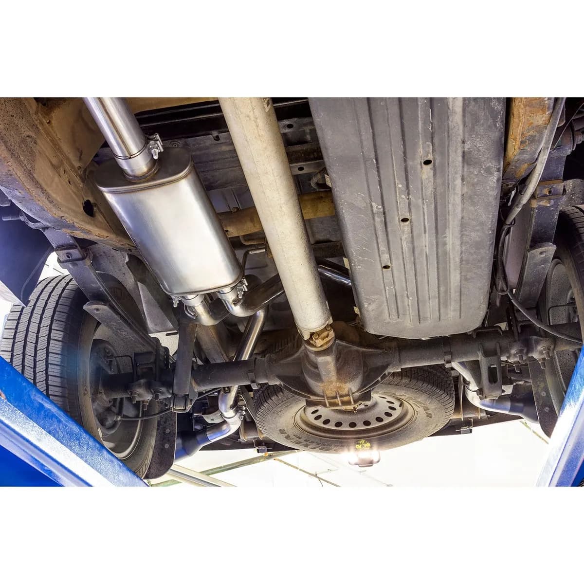 09-13 GM SilveradoSierra 12 Ton 5.3L WFlex Fuel Extended Cab and Crew Cab Only 24 Wheel Drive Cat-back 2.50 Tailpipes FlowFX Series Muffler 4.50 Black Ceramic Logo Embossed Stainless Tips FlowFX DOS Mandrel Bent Tubing 409S Stainless Ste