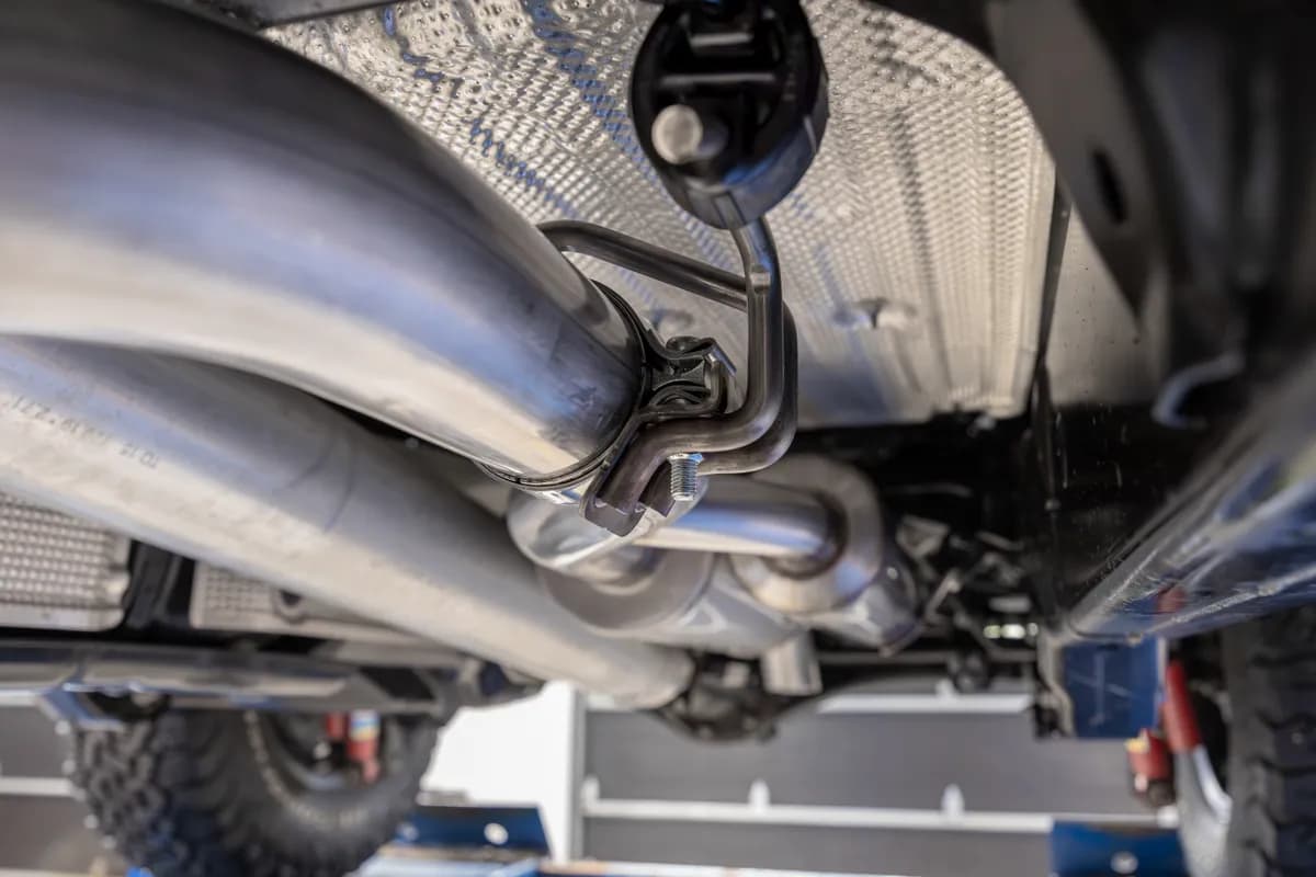 Armor Lite Cat Back Exhaust System; 3 in.; Aluminized Steel; Single Side Exit; Pre-Axle; Turn Down Tail;